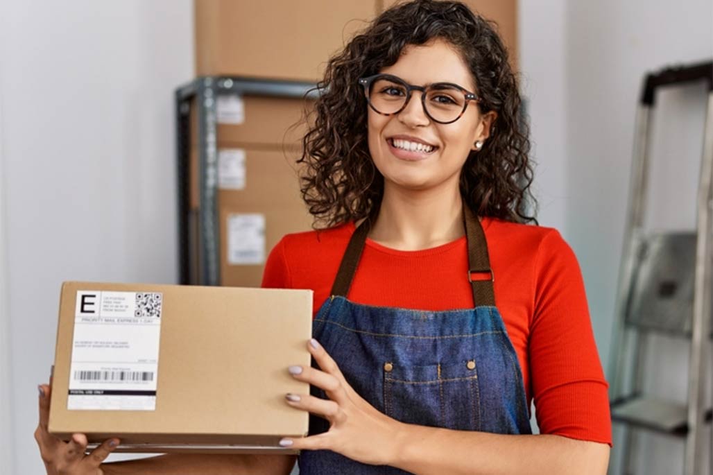 A woman holding a parcel